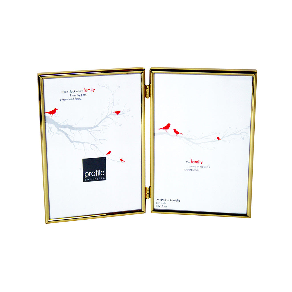 A shiny finish metal double vertical standing photo frame with a thin rounded design in brass